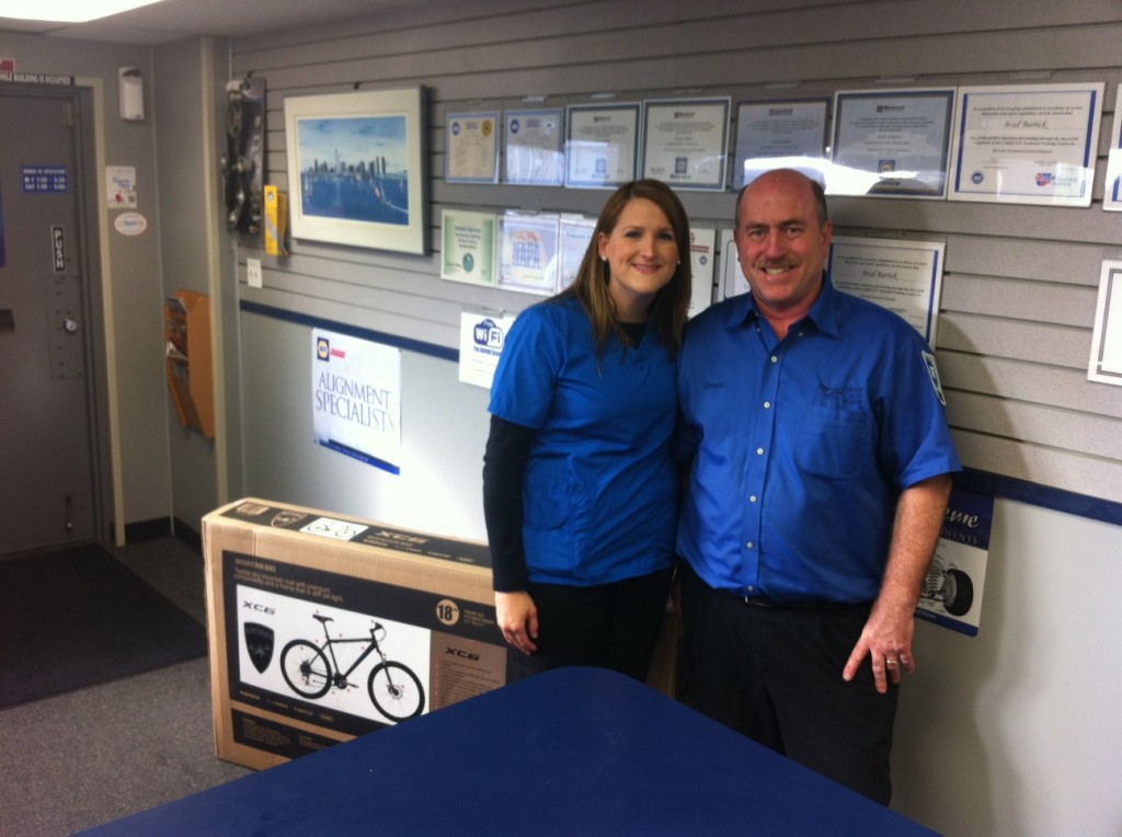 Jessica at Convoy Auto Repair with her new bike